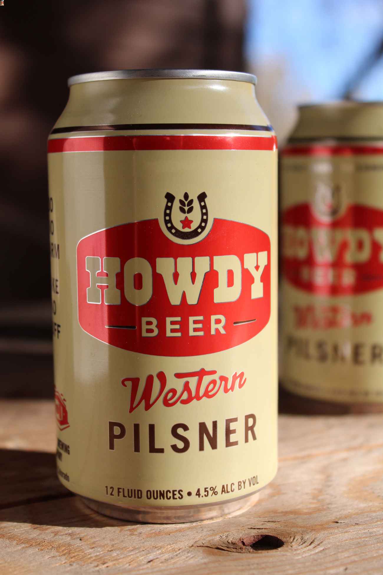 Yellow and red can of Howdy Beer.