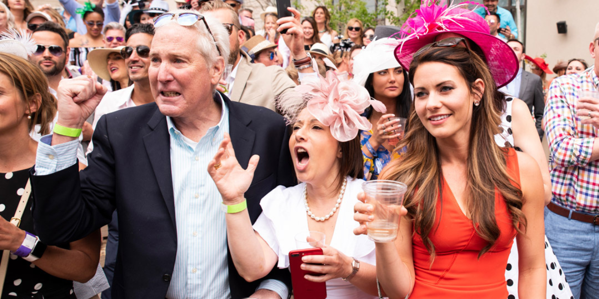 Denver people cheering at one of Denver Derby Parties