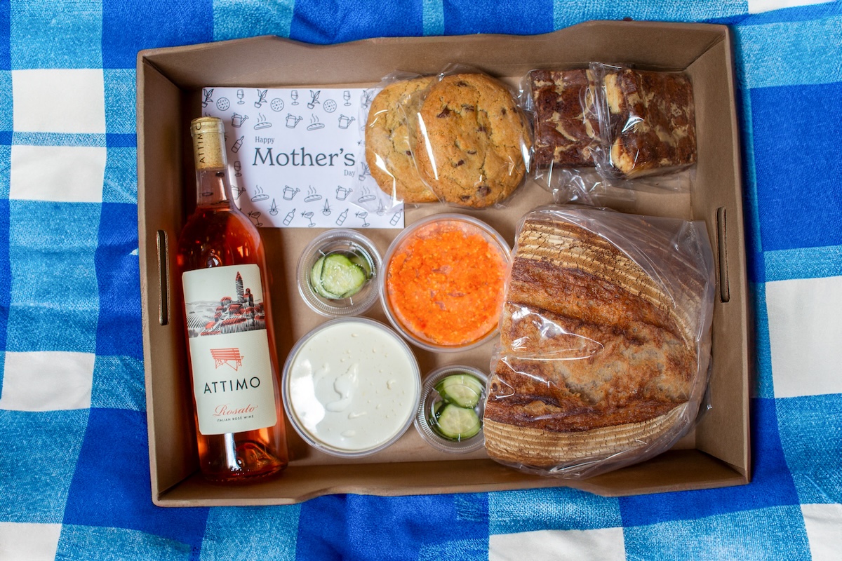 picnic box with bread and wine