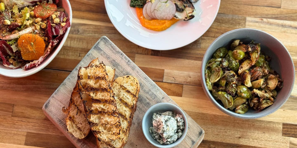 January 19th marks the day when most New Year's resolutions, especially those about healthier eating, start to wobble like a poorly stacked sandwich. Fear not, Denver! We're here to help you navigate back to the path of nutritional righteousness without skimping on flavor. Say goodbye to the days of limp lettuce and hello to vibrant, delicious dishes that make you wonder why you ever strayed. From the bohemian charm of Bang Up to the Elephant, with its tropical vibes and vegan beach shack menu, to the soul-nourishing Mediterranean fare at Somebody People, Denver's dining scene has never made it easier to eat well while eating out.