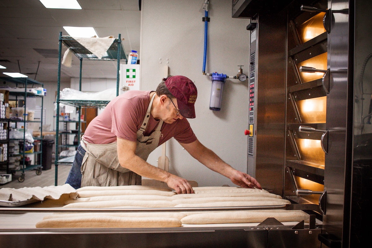 doug_anderson_leven_deli man making bread