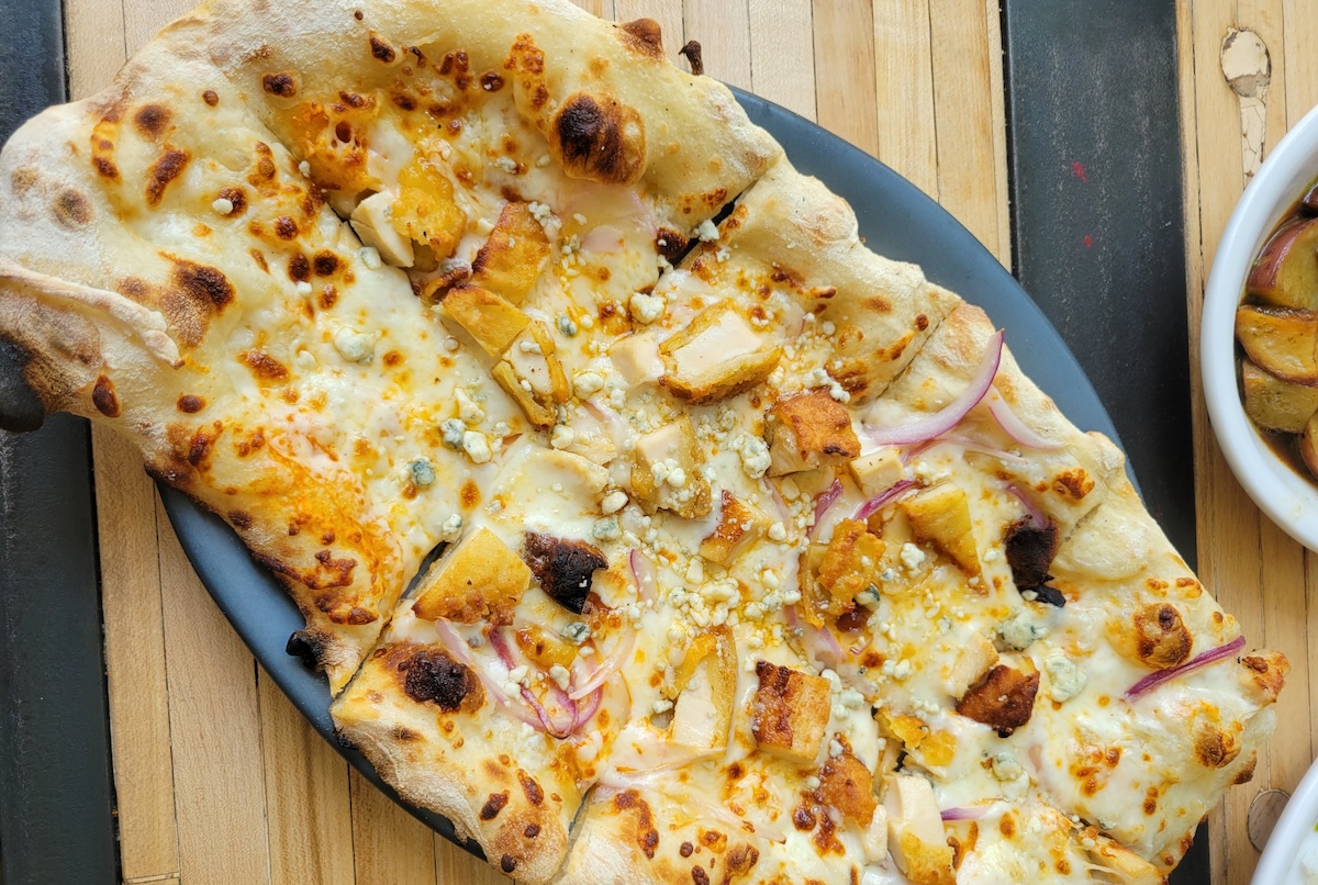 The Buffalo Chicken Flatbread from The Colorado Club, the latest from Half Eaten Cookie Hospitality. | Photo by Linnea Covington
