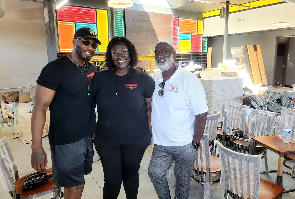welton_street_cafe_by_covington Part of the Dickerson family that owns and operates Welton Street Cafe, Fathom (left), Fathima (center), and their dad, Flynn (right). | Photo by Linnea Covington