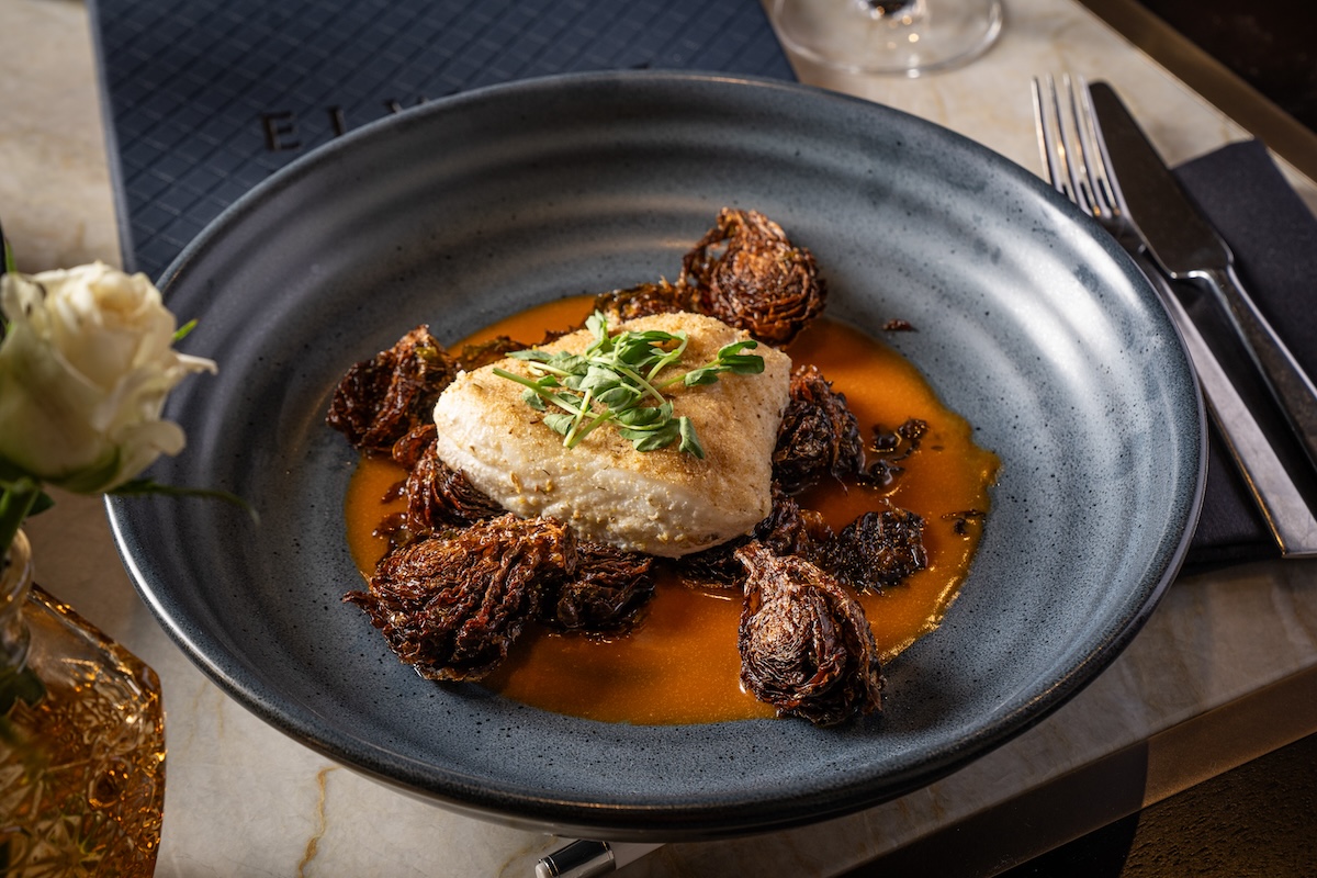 fish_elways_downtown Fennel Braised Halibut with carrot butter sauce at Elway's Downtown. | Photo by The Ritz-Carleton