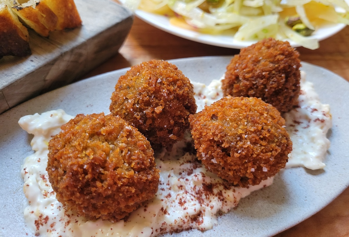 arancini_somebody_people_by_covington Don't miss out on the vegan arancini at Somebody People. | Photo by Linnea Covington