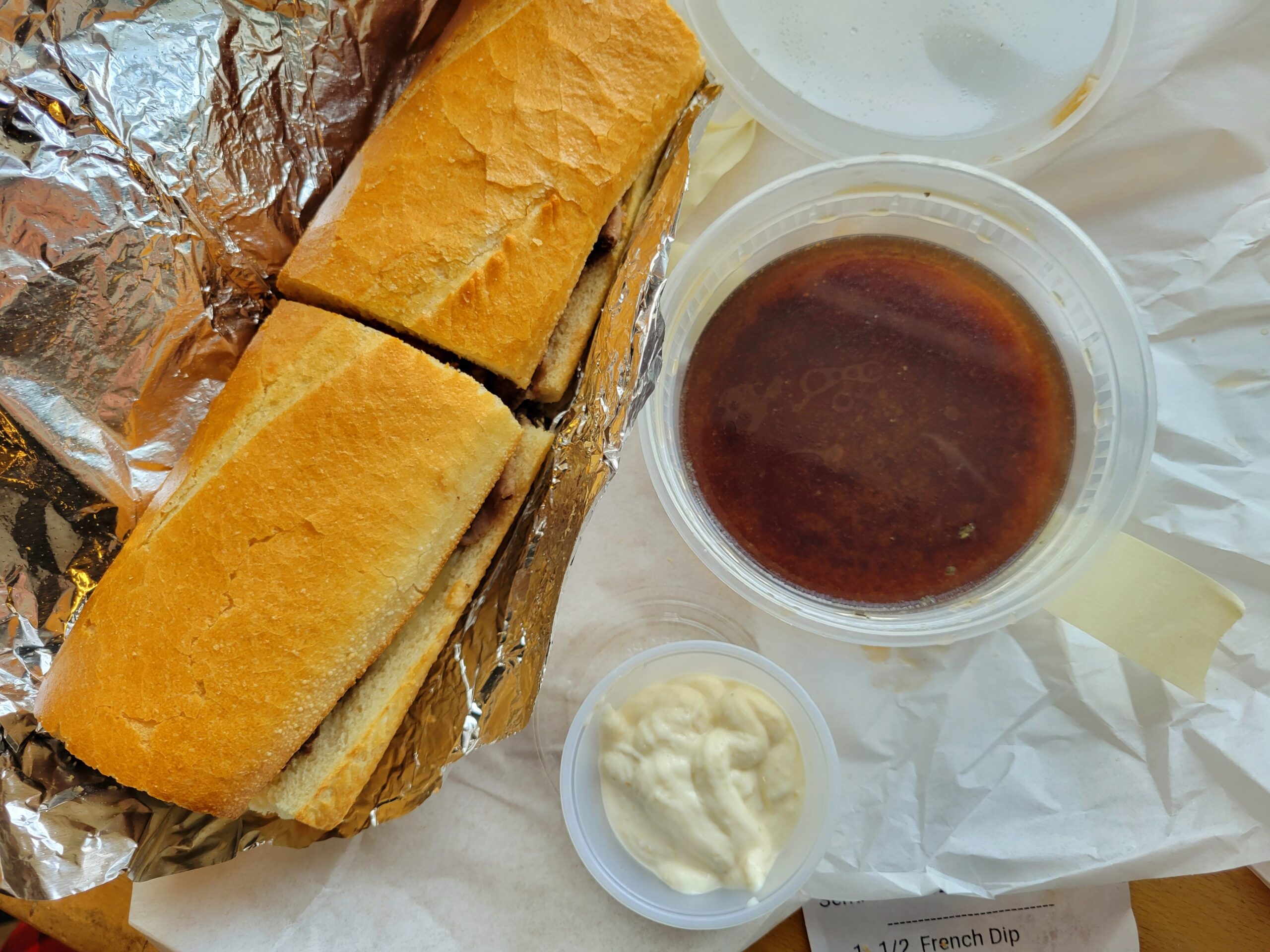 Mr_Luckys_French_dip_whole_by_Covington news Mr. Lucky's Sandwiches is open, for now. | Photo by Linnea Covington
