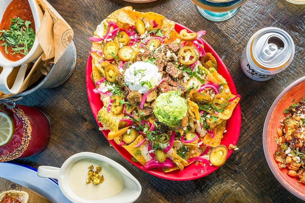 Happy hour nachos are a must when visiting the busy RiNo Mexican restaurant. | Photo by Federales