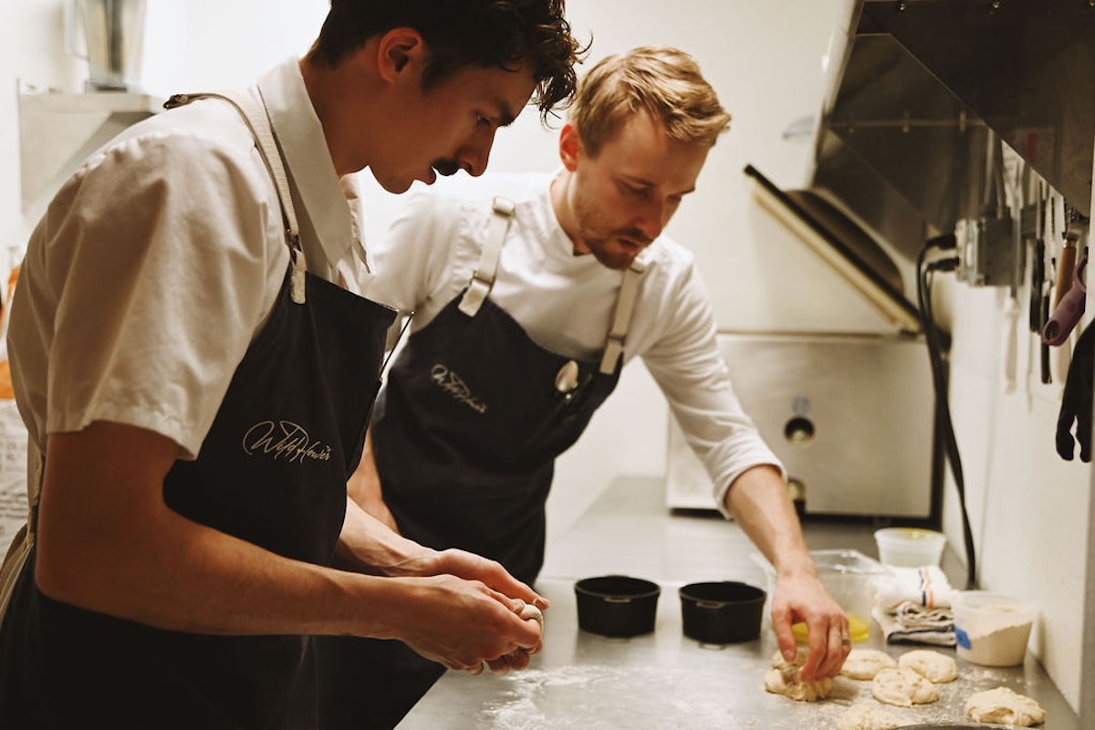 Chef Aiden Tibbetts in the kitchen at Wildflower. | Photo by Kelly Calvillo