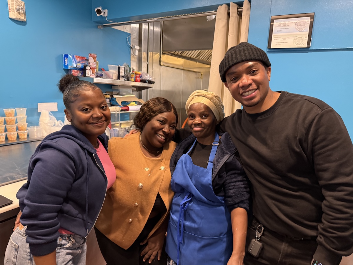 509_haitian_mango_house_by_antony_bruno The team at 509 Cuisine, a Haitian food stand in Mango House. | Photo by Antony Bruno