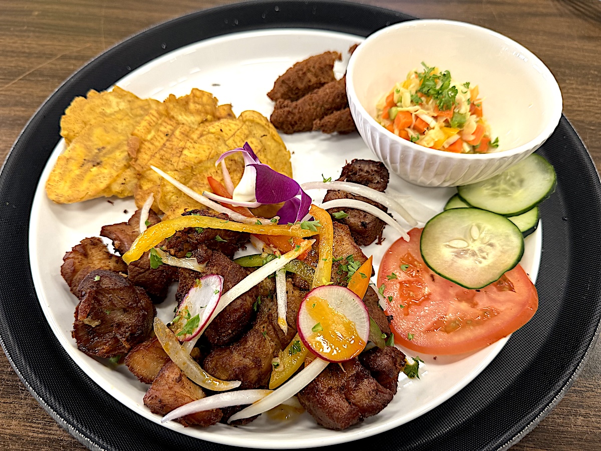 mango_house_509_hatian_by_antony_bruno Griot, a marinated pork shoulder and belly that's slow briased and then fried. Served at 509 Cuisine in Mango House. | Photo by Antony Bruno