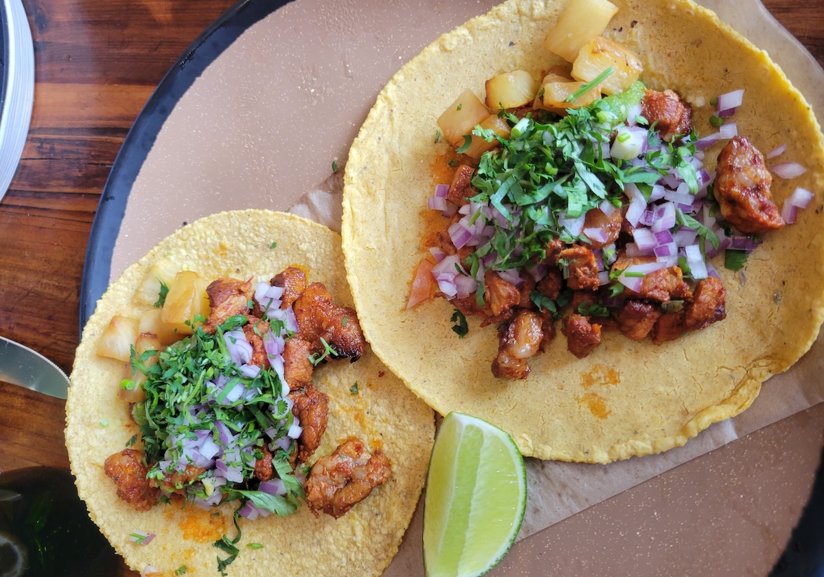 xiquita_happy_hour_al_pastor_tacos_by_covington Tacos al Pastor off the Xiquita Taqueria menu. | Photo by Linnea Covington
