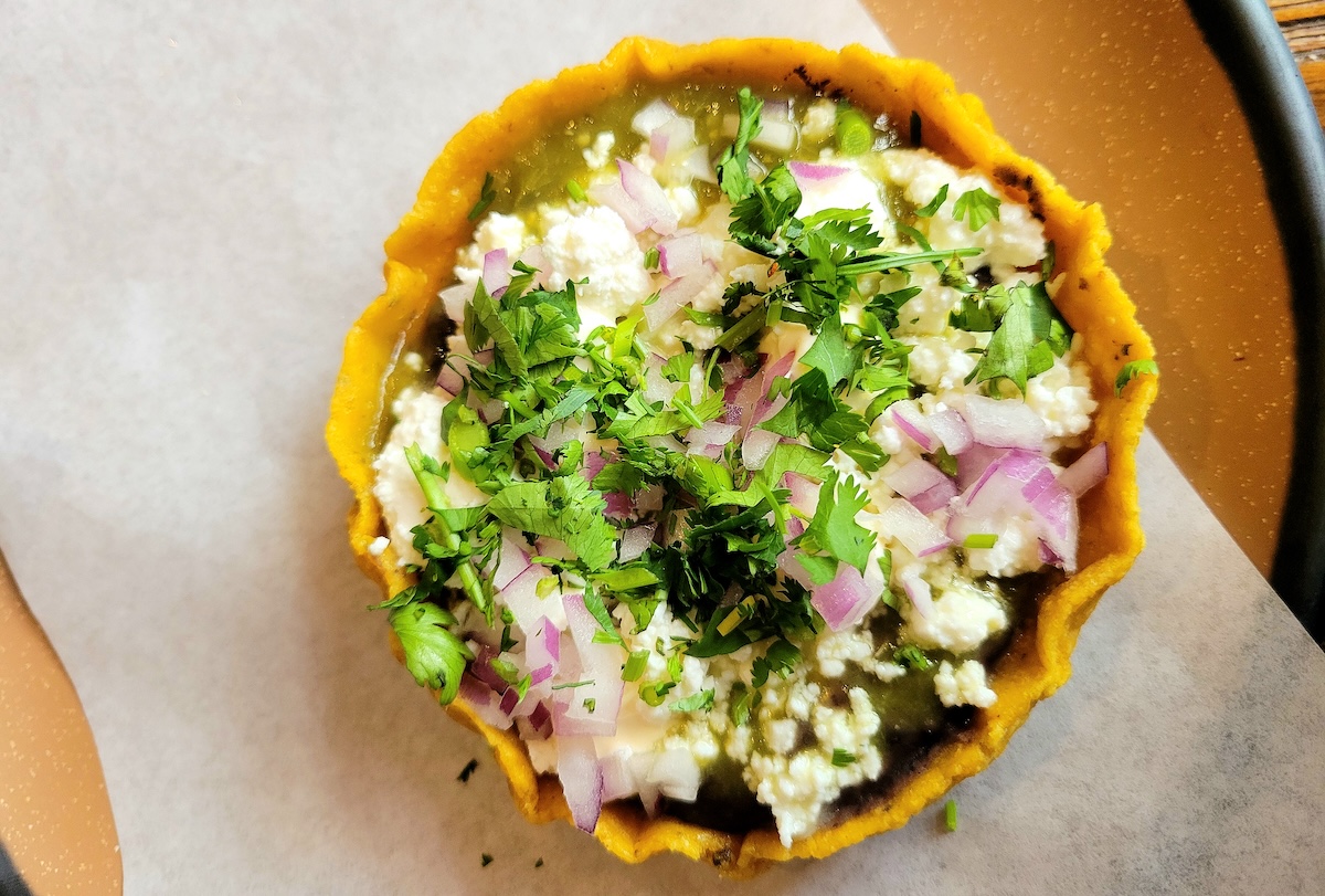 xiquita_happy_hour_sopecito_by_covington The bean and cheese sopecita is one of the items on the happy hour menu. | Photo by Linnea Covington