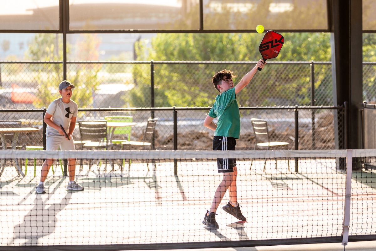 Chicken N Pickle Youth Pickleball Pickleball is for all ages and can be played with two or four. | Photo by Chicken N Pickle