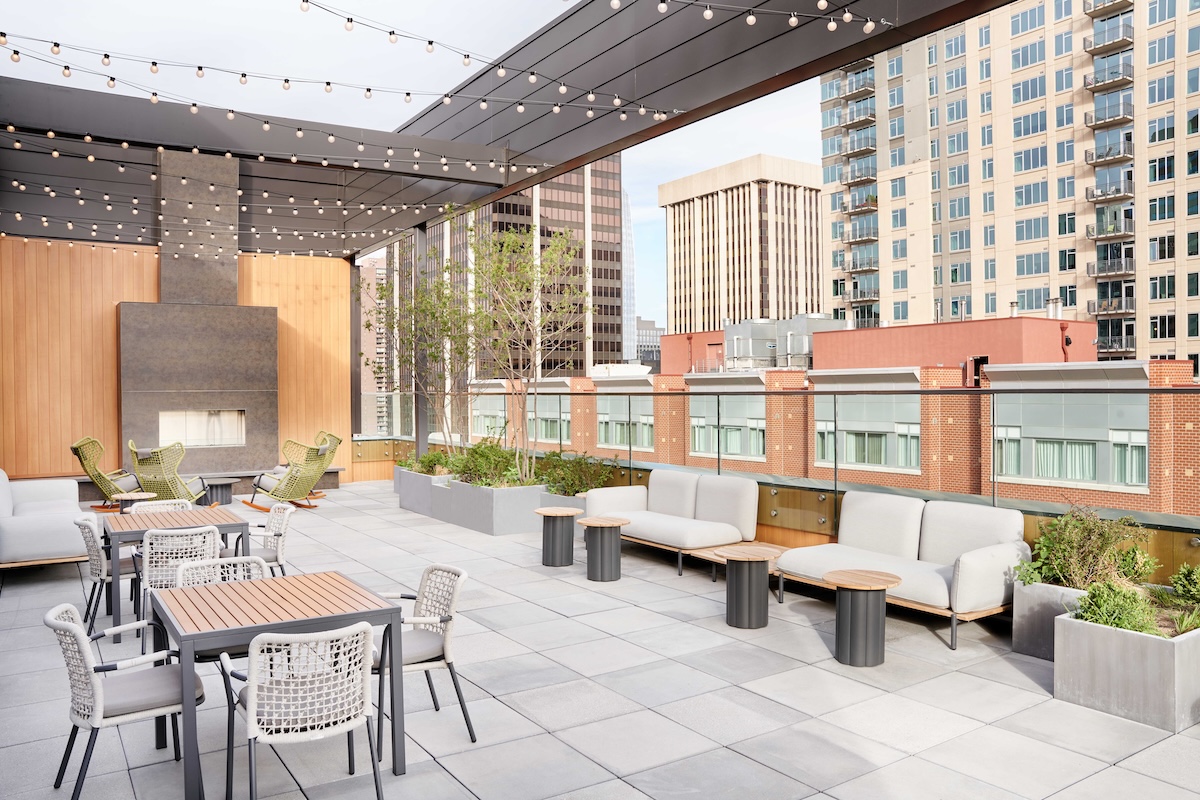 DENCT-Rooftop-Terrace-6304 Apple Blossom serves on the roof patio. | Photo by Hyatt Centric Downtown Denver