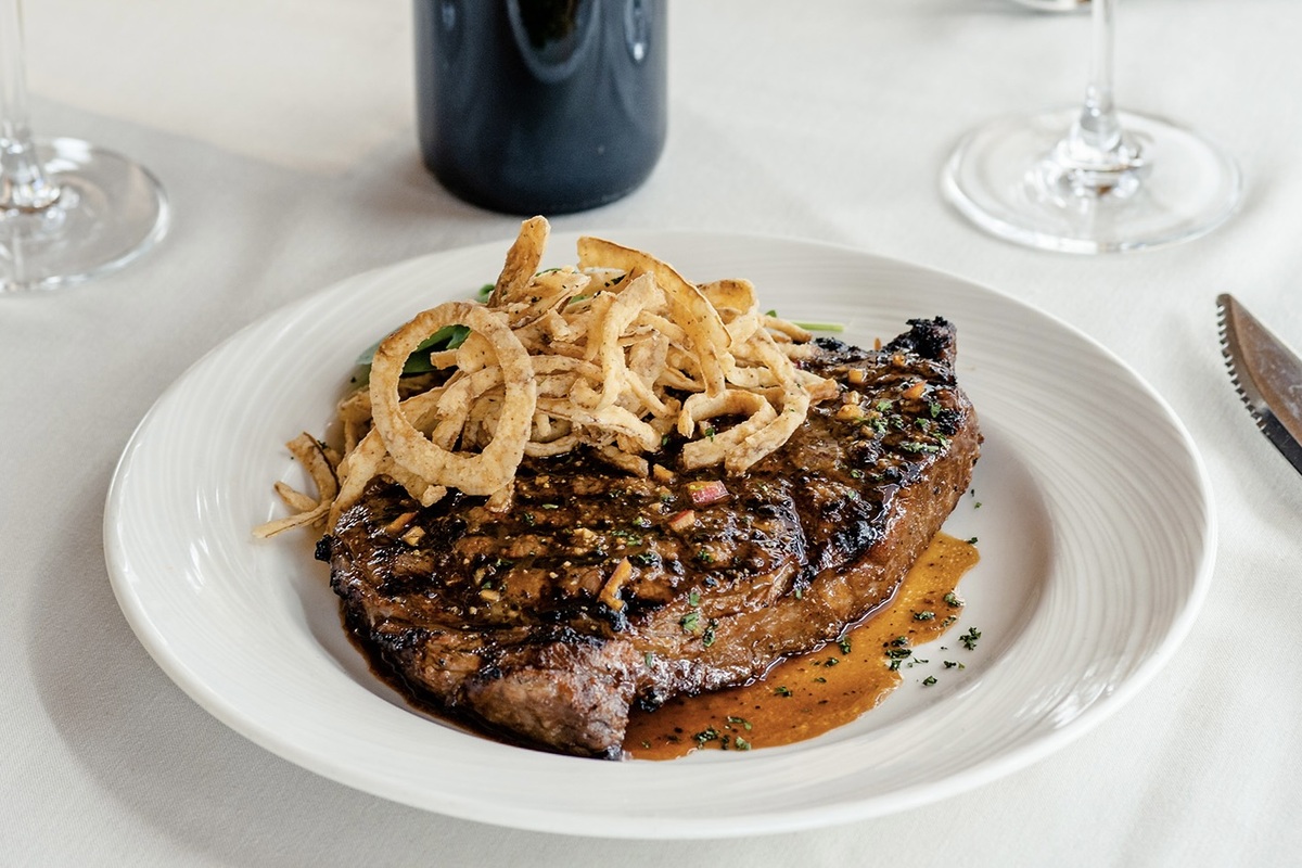 Eddie_Merlots_Prime_Bourbon_Ribeye A sixteen-ounce prime ribeye marinated in bourbon and brown sugar | Photo by Eddie Merlot's