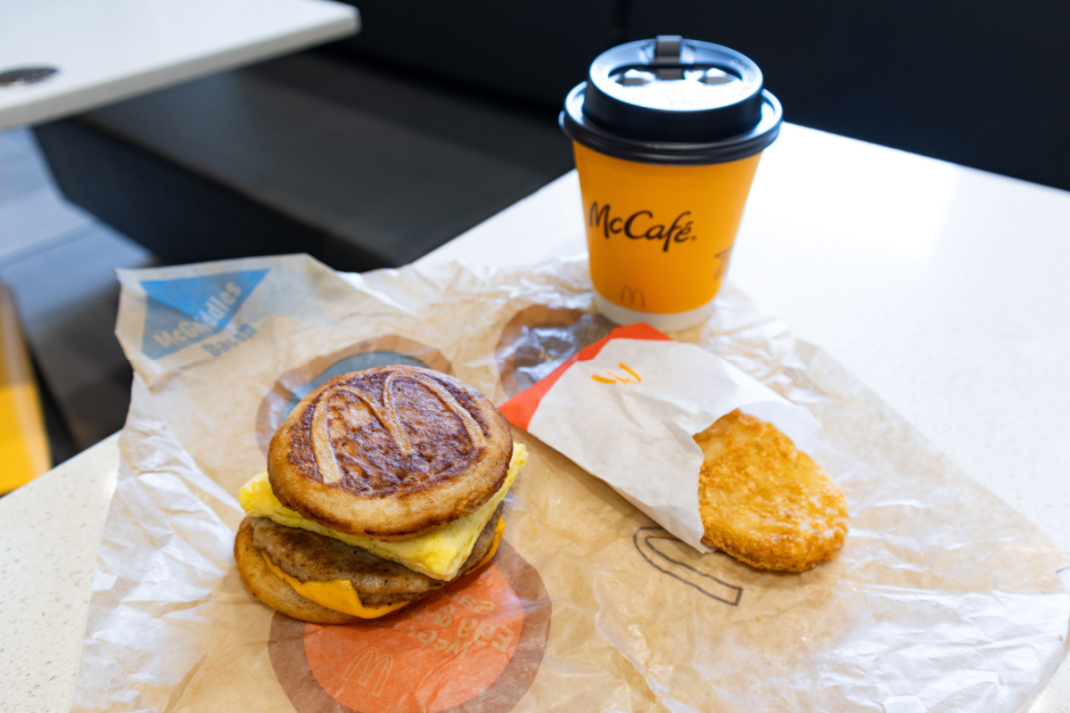 McDonalds New York, New York USA - February 24 2024: McDonald's McGriddles Meal with Hash Browns and a Coffee inside a McDonald's Restaurant