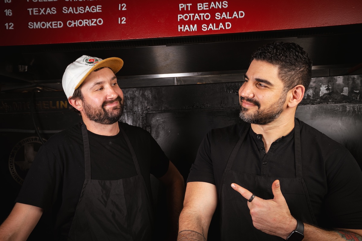 Patrick _Klaiber_Manny _Barella _riot_bbq Pitmaster Patrick Klaiber with chef Manny Barella, owners of Riot BBQ. | Photo by Alex Arredondo