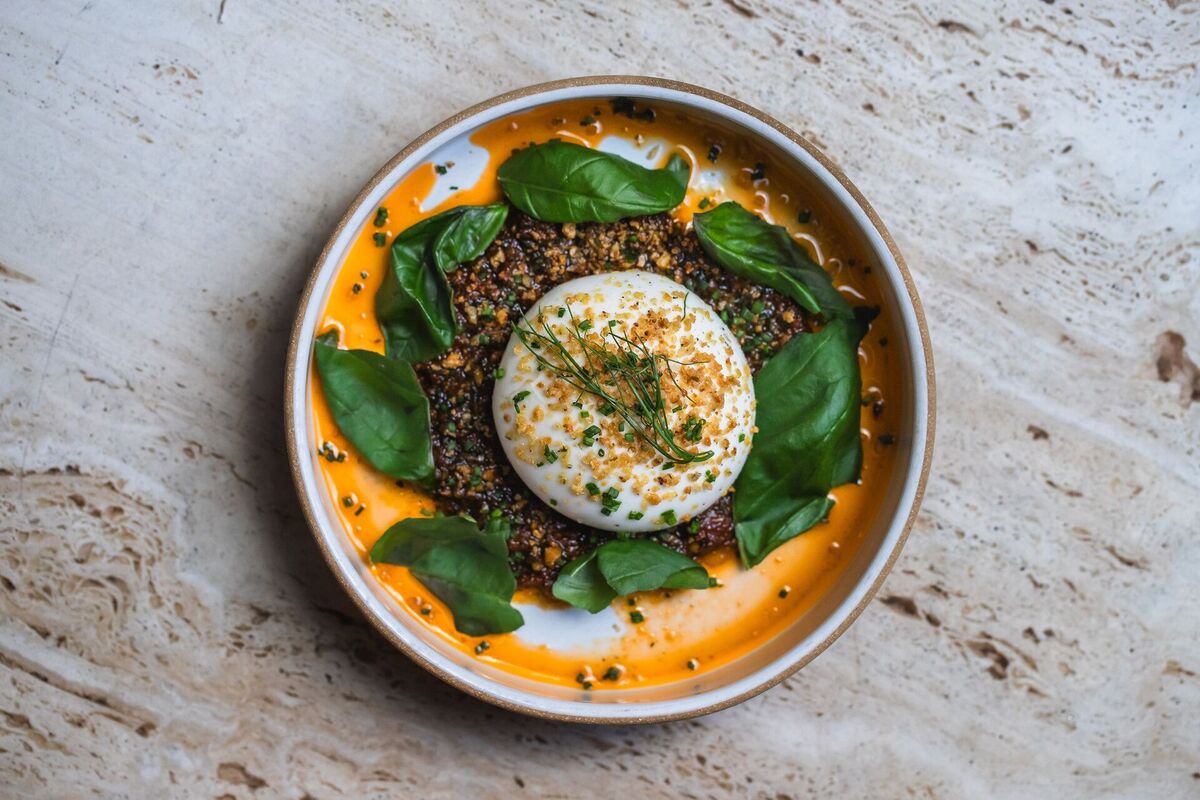 Tavernetta_Burrata_by_Casey_Wilson Burrata with trapanese pesto, focaccia breadcrumbs, and fresh basil | Photo by Casey Wilson