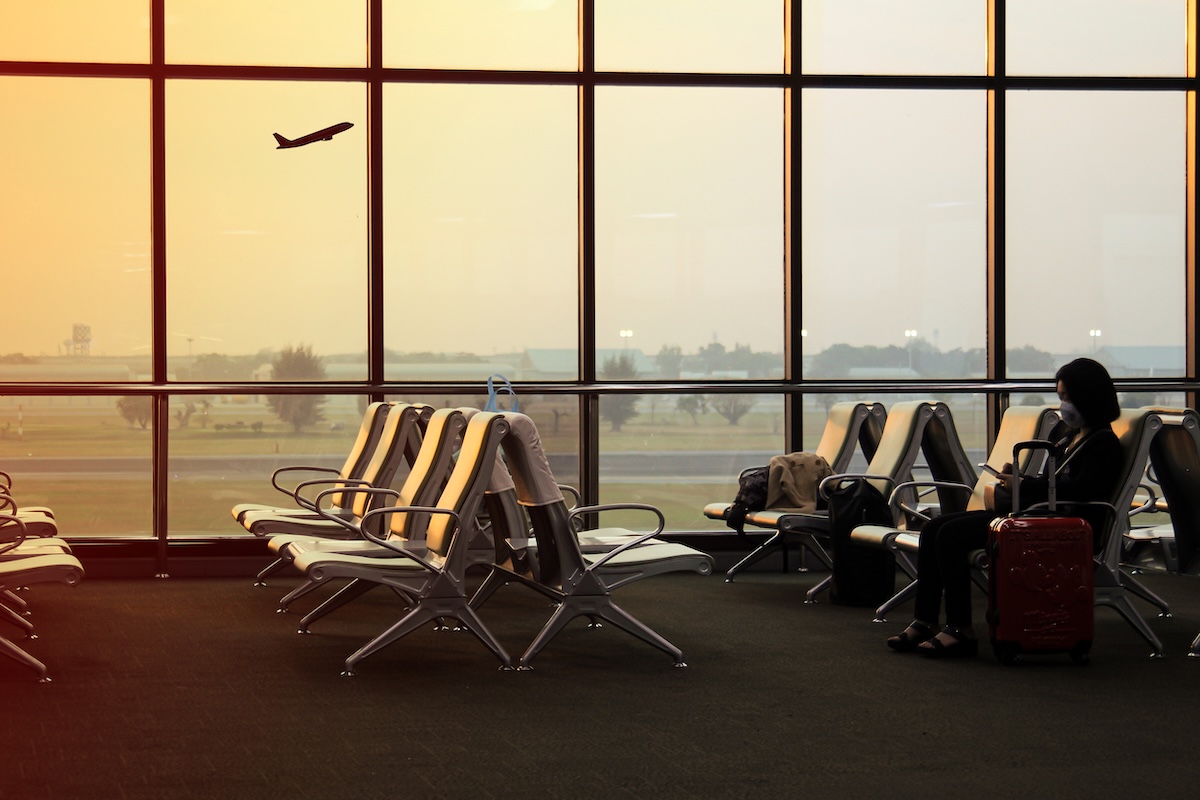 Airport waiting area with chairs and luggage at airport terminal Travel concept airport dining