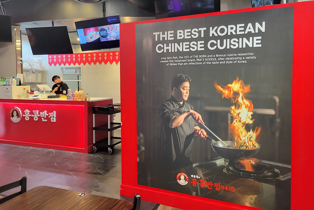 paiks_noodle_aurora_by_covington_sign Jong Won Paik is a celebrity chef in Korea with a large restaurant group. | Photo by Linnea Covington