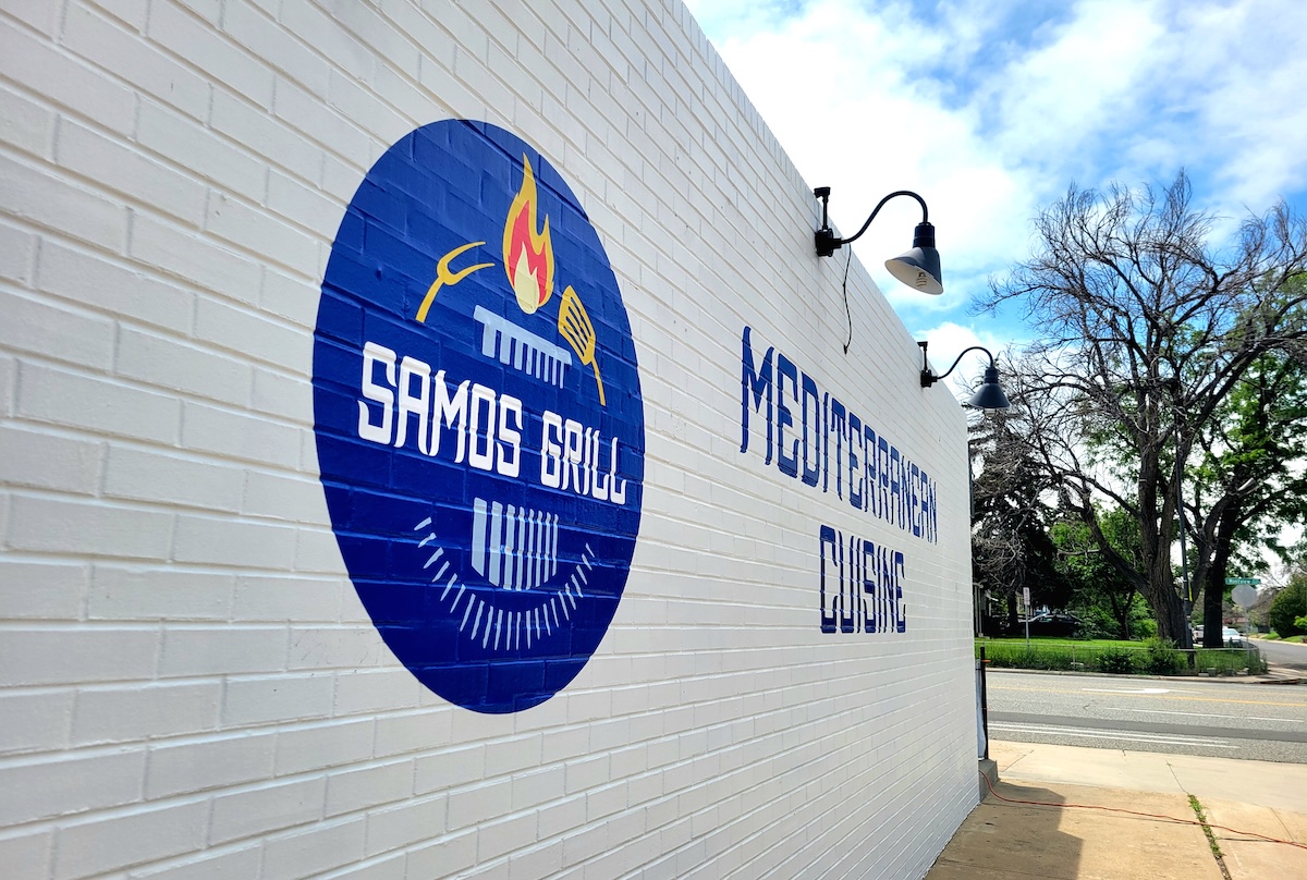 samos_grill_wall_by_covington The brick and mortar version of Samos Grill food truck is now open in Aurora. | Photo by Linnea Covington