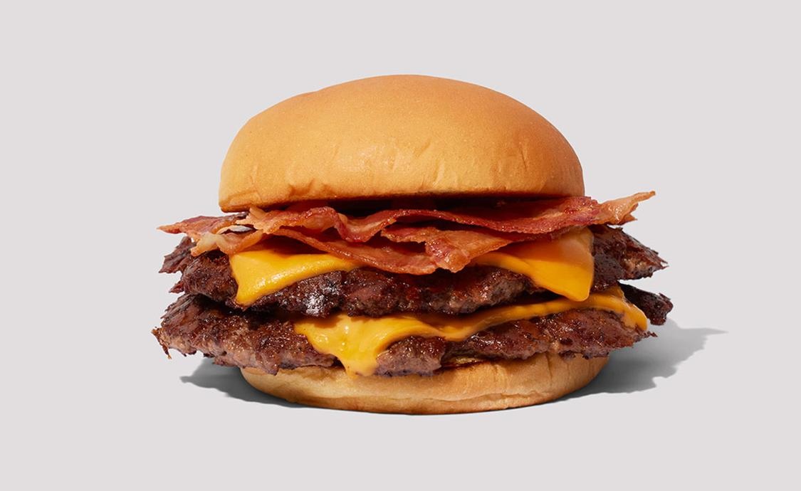 shake_shack_burger Get a fresh burger to take on the plane, or eat before your flight. | Photo by Shake Shack