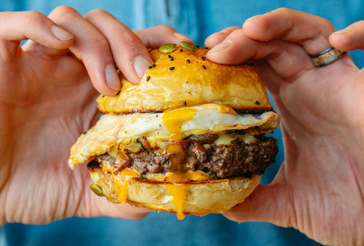 sullivan_scrap_kitchen_burger_beyond_apron The Breakfast Burger is almost as big as the classic cheeseburger at Sullivan Scrap Kitchen. | Photo by Beyond the Apron Media
