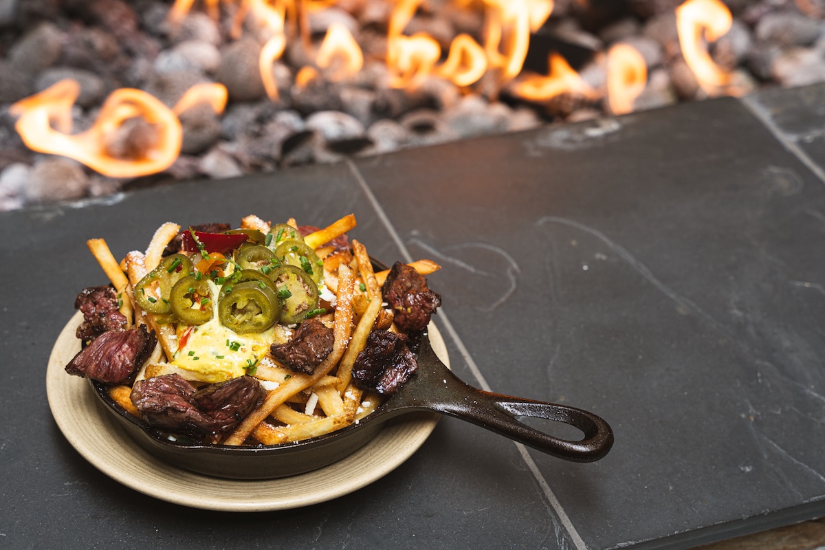 toro_Loaded Skirt Steak Truffle Fries Loaded Skirt Steak Truffle Fries from Toro by Richard Sandoval. | Photo by Toro