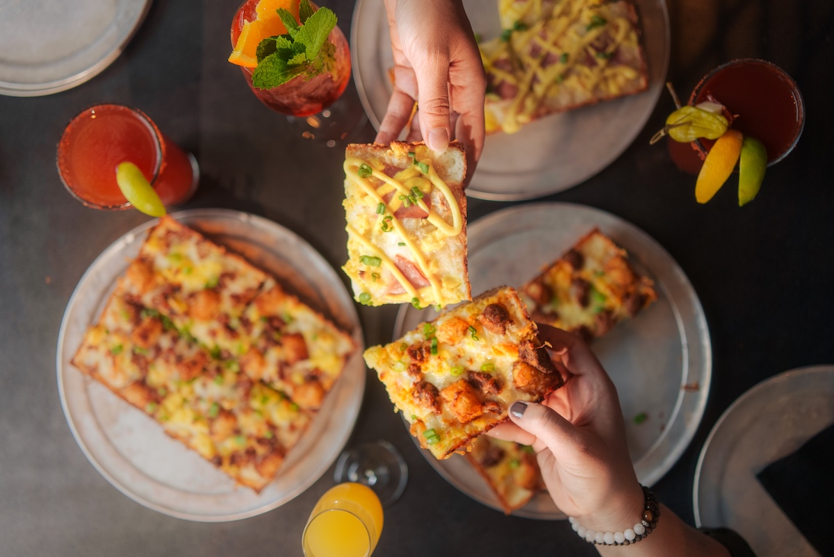 via_313_brunch_pizza_sharing Head to Via 313 for a new line of brunch foods and breakfast pizza. | Photo by Via 313