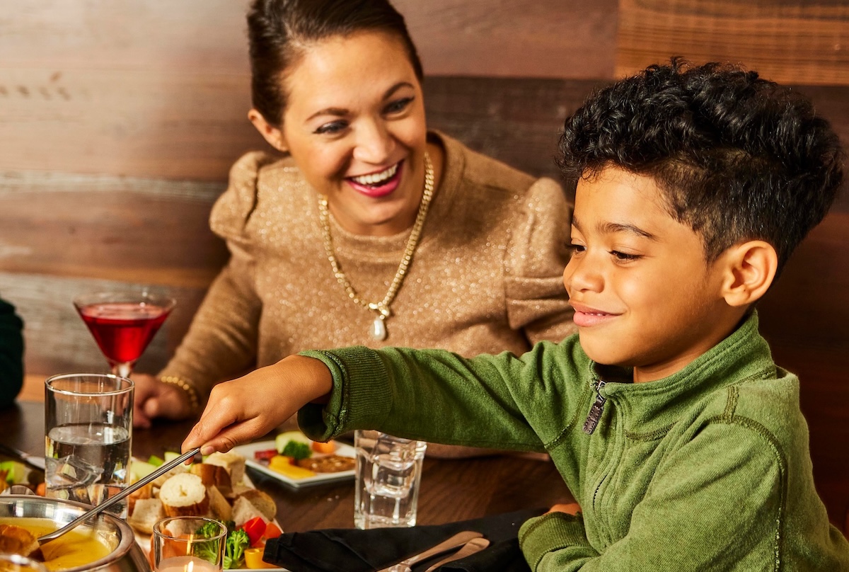 melting_pot_kid The Melting Pot in Littleton makes dinner fun, kids eat free Sundays and Tuesdays with a paying adult. | Photo by Melting Pot