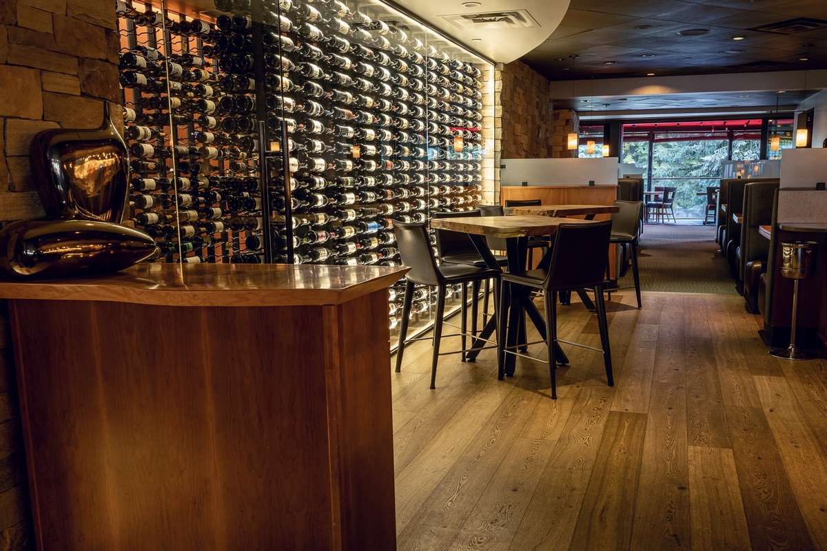 The glass wine room was part of a recent renovation | Photo by Sweet Basil