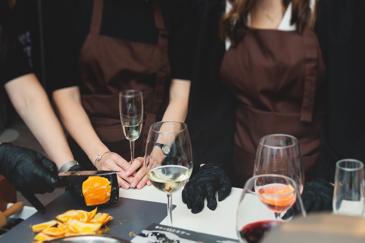 people aprons wine hands stock image