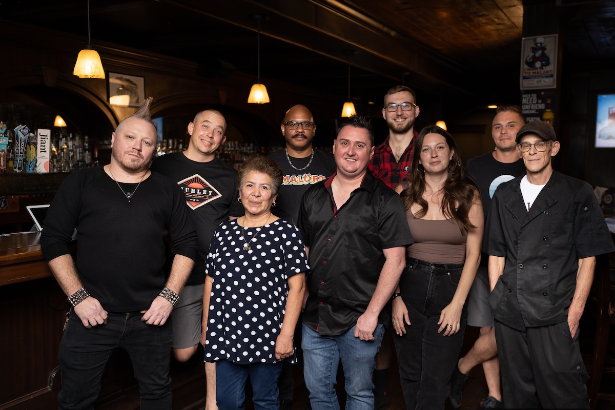 Owner Dusty Jones and the crew at his pub. | Photo by Wild Corgi Pub