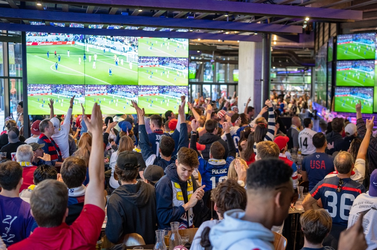 Toms_Watch_Bar Catch the game and play a round in its golf simulator | Photo by Tom's Watch Bar