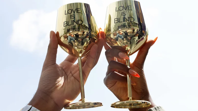 The iconic Love Is Blind wine glasses are sure to make it to the Denver dining scene. | Photo by Roger Kisby