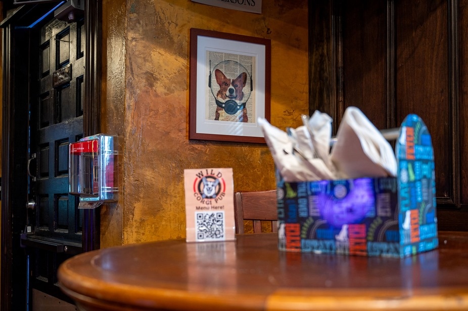Take a seat in the casual pub setting. | Photo by Wild Corgi Pub
