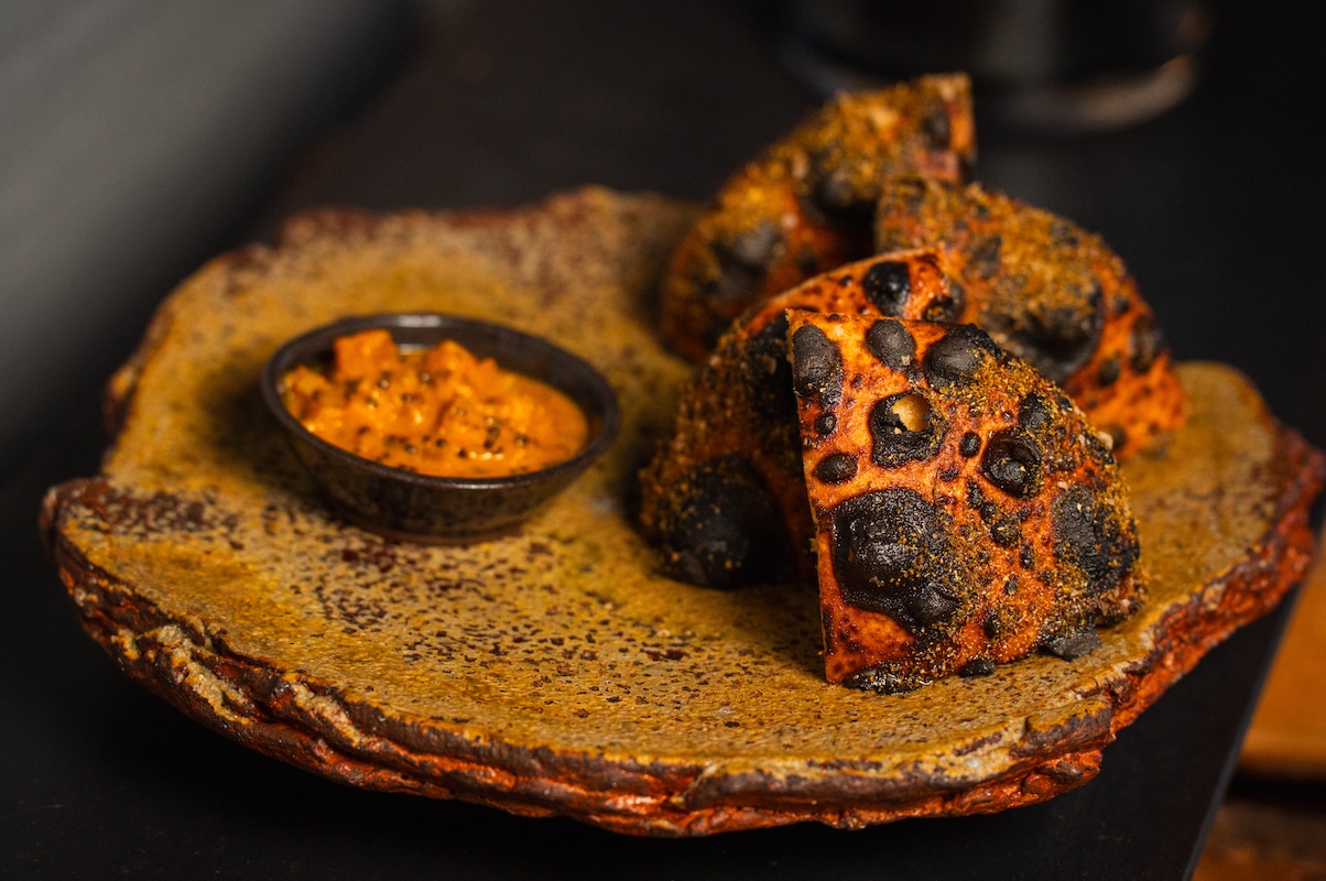 bruto_bread_by_Jeff_Fierberg BRUTO serves wood-fired bread, often with a preserve or fermented component. | Photo by Jeff Fierberg